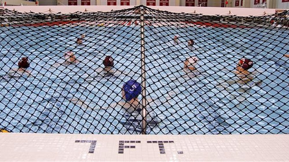The IU water polo team practices Feb. 28 at the Counsilman/Billingsley Aquatic Center.