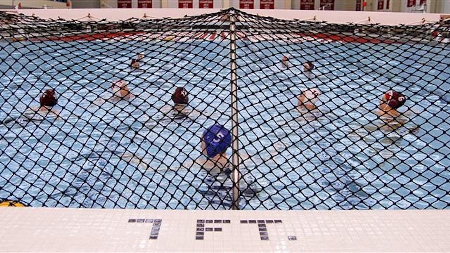 The IU water polo team practices Feb. 28 at the Counsilman/Billingsley Aquatic Center.