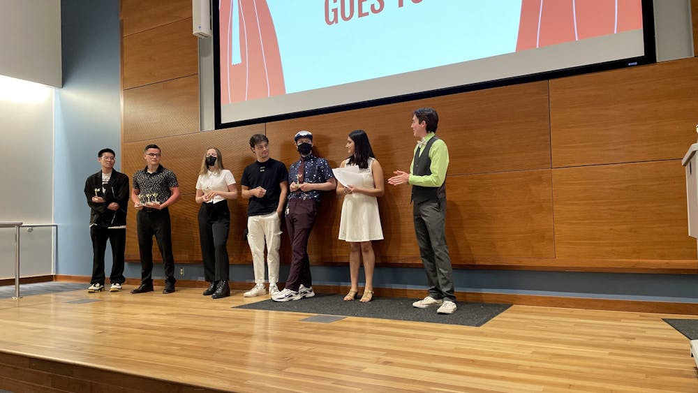 The winners of Saturday&#x27;s student film festival line up with their awards at the end of the ceremony. Awards categories included for the festival include best director, best acting and best fiction and non-fiction, among others.