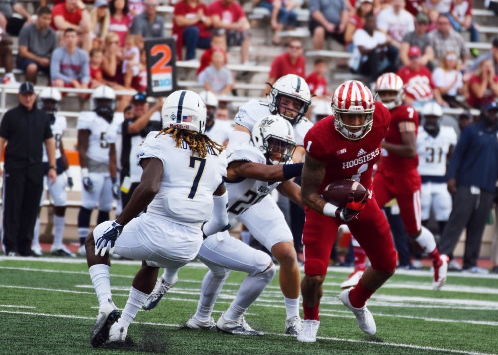 ​Senior wide receiver Simmie Cobbs Jr. attempts to run with the ball before being tackled by Charleston Southern during the Oct. 7 game at Memorial Stadium. IU (3-2) plays No. 17 Michigan (4-1) today in Bloomington.&nbsp;