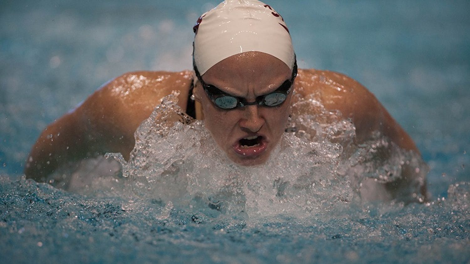 Junior Bailey Pressey swims the butterfly leg of the 400 yard IM on Friday night at the Hoosierland Invitational.
