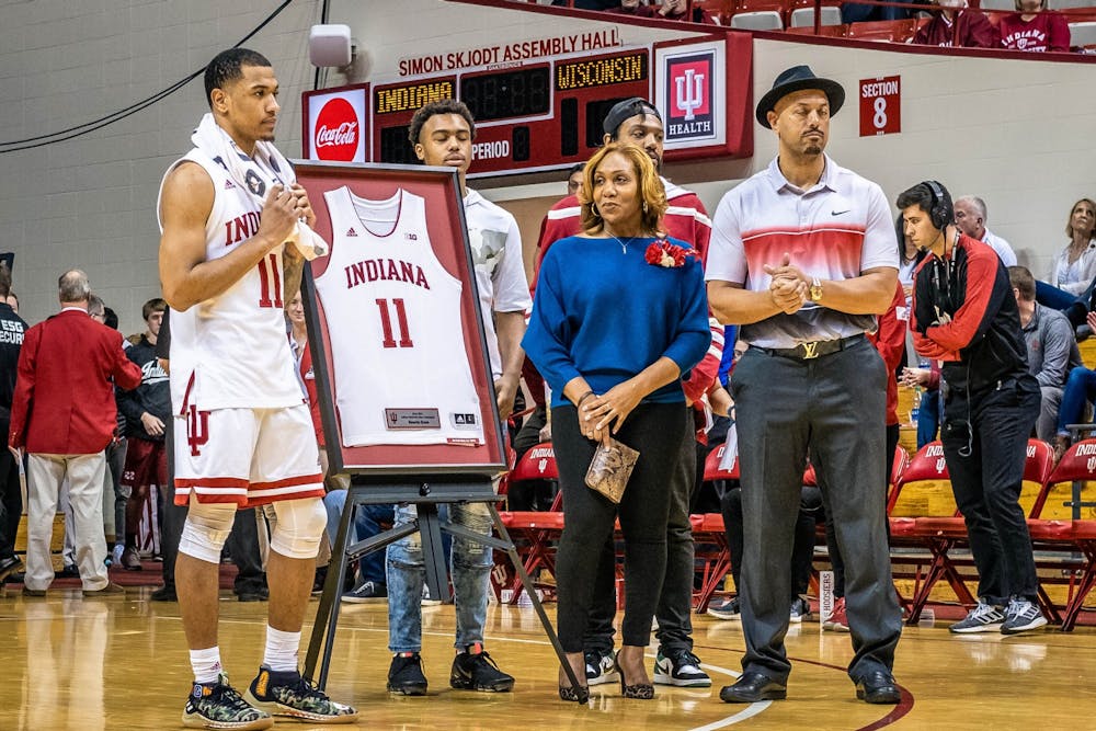 <p>Senior guard Devonte Green standswith his family March 7 in Simon Skjodt Assembly Hall while being recognized for senior night. Wisconsin defeated IU 60-56.</p>