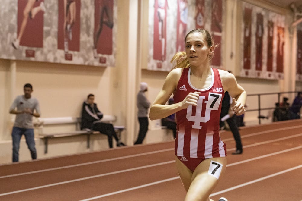 <p>Sophomore distance runner Baily Hertenstein runs in the 3000-meter run Feb. 14, 2020, in Gladstein Fieldhouse. Hertenstein placed first in the 1500-meter run at the Florida Relays with a time of 14:15.25.</p>