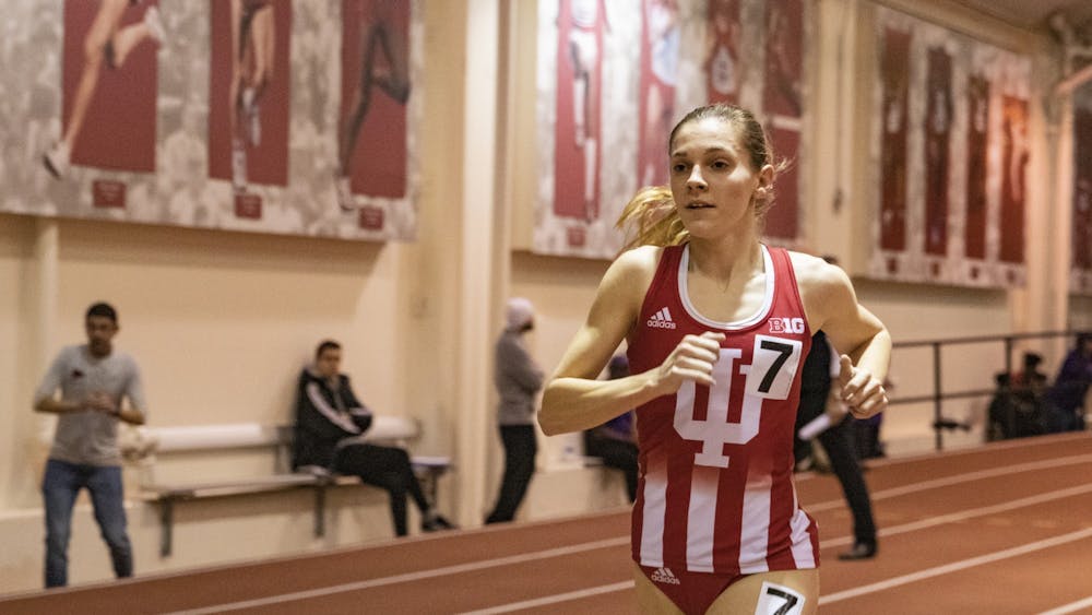 Sophomore distance runner Baily Hertenstein runs in the 3000-meter run Feb. 14, 2020, in Gladstein Fieldhouse. Hertenstein placed first in the 1500-meter run at the Florida Relays with a time of 14:15.25.