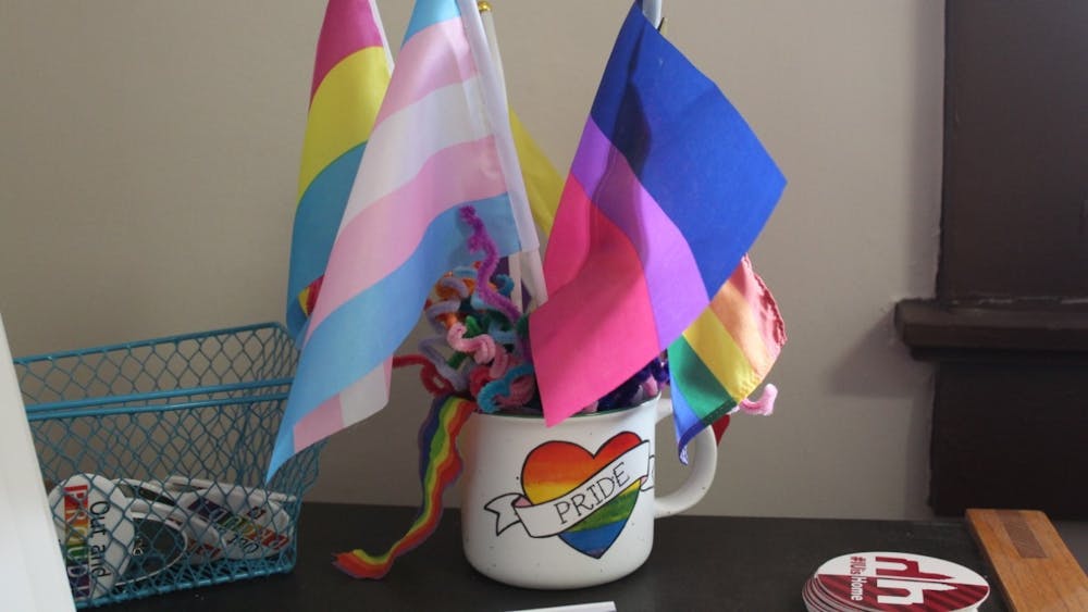 An assortment of miniature pride flags is seen inside of a mug on Feb. 21, 2023, in the LGBTQ+ Culture Center. Brianna Ghey, a 16-year-old transgender TikToker, was stabbed on Feb. 11, 2023, in Chesire, England.