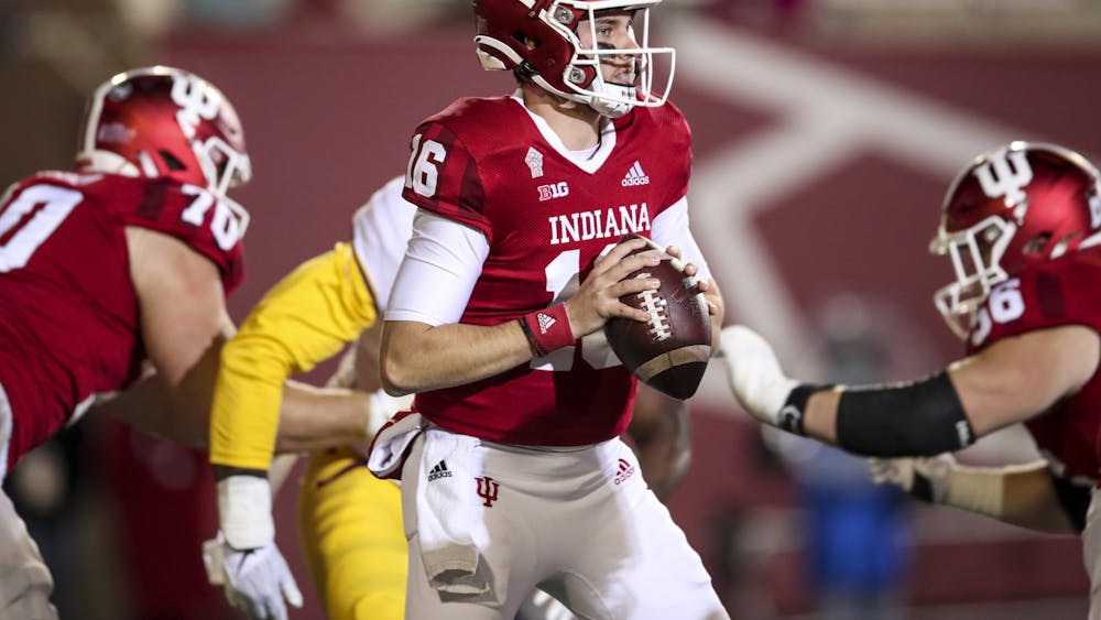 Sophomore quarterback Grant Gremel drops to throw against Minnesota on Nov. 20, 2021, at Memorial Stadium in Bloomington. Gremel earned a roster spot as a walk-on in 2019.