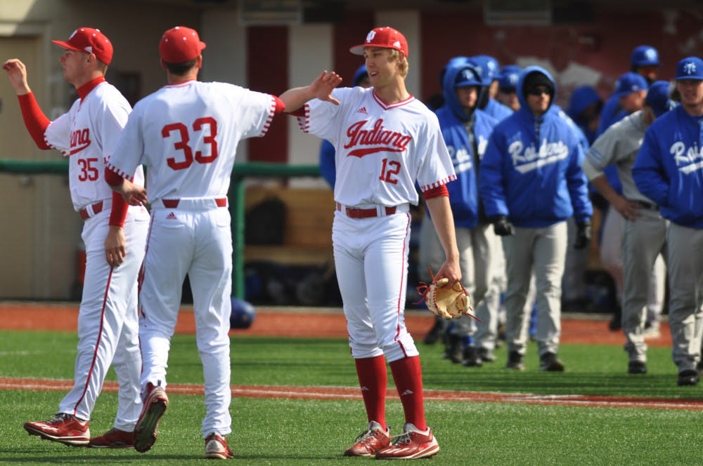 Junior B.J. Sabol is congratulated by teammates after pitching the final inning of IU’s 6-0 win over Middle Tenessee State on Sunday. IU finished their opening weekend at home with wins in 2 games out of 3.