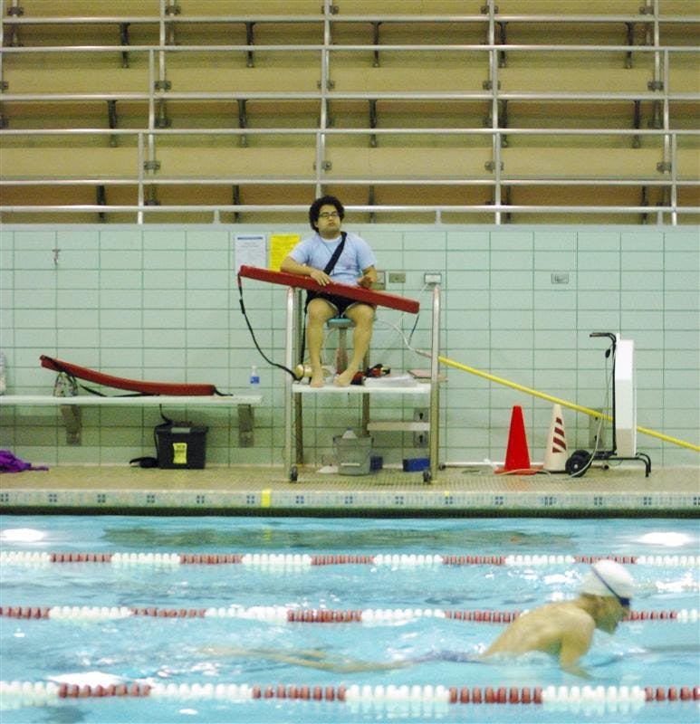 Junior lifeguard Patrick Rud on duty Tuesday afternoon in the Royer Swimming Pool in the Health, Physical Education and Recreation Building. Recreational Sports will be hosting two Red Cross training sessions for certification to become a lifeguard. 