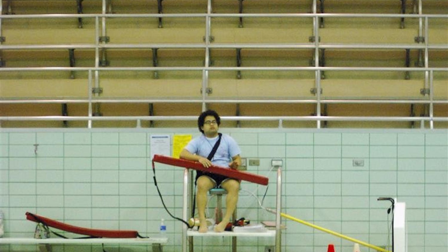 Junior lifeguard Patrick Rud on duty Tuesday afternoon in the Royer Swimming Pool in the Health, Physical Education and Recreation Building. Recreational Sports will be hosting two Red Cross training sessions for certification to become a lifeguard.