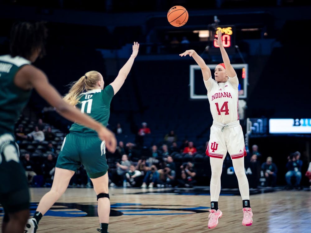 Senior guard Sara Scalia shoots a three March 3, 2023, at the Target Center in Minneapolis. Indiana defeated Michigan State 94-85.