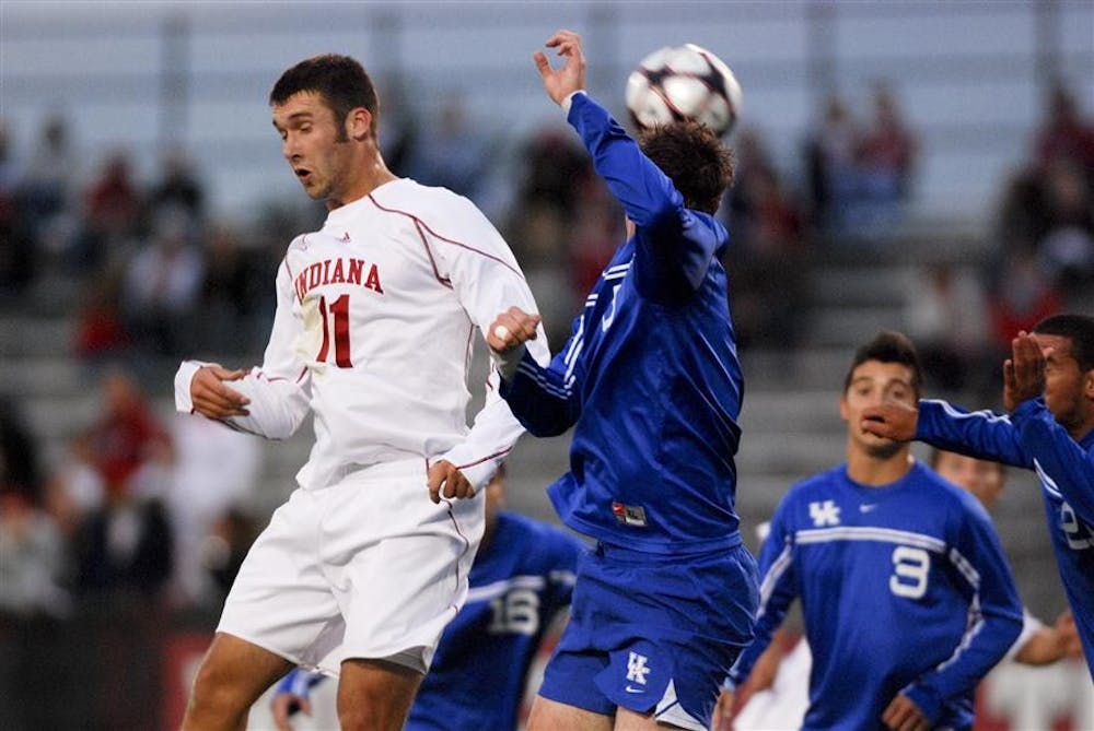 Sophomore forward Will Bruin battles Kentucky's Brad Walker for a header near the Kentucky goal Tuesday, Sept. 29 at Bill Armstrong Stadium. The Hoosiers won 3-0 and will take on the Fighting Irish today in South Bend.