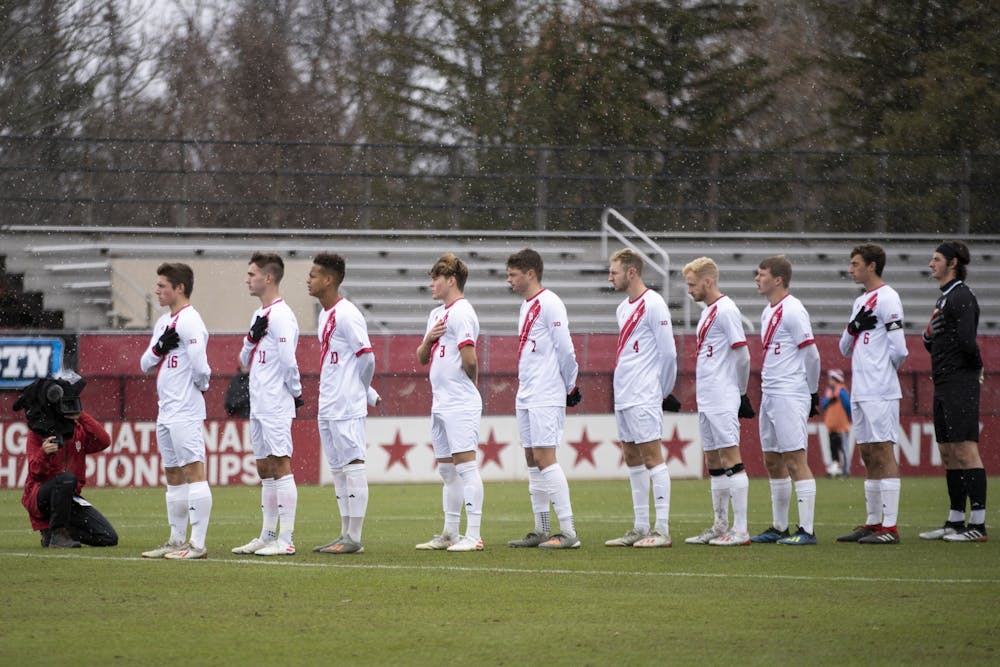 IU men’s soccer stands during the National Anthem on Dec. 1 at Bill Armstrong Stadium. 