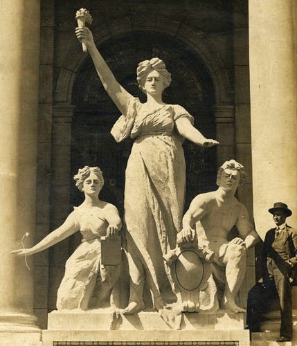 COURTESY Monroe County Historical Society CollectionIn this 1908 photograph sculptor Albert Jacob Molnar stands next to the "Light of the World" figures he carved for the south side of the Monroe County Courthouse.