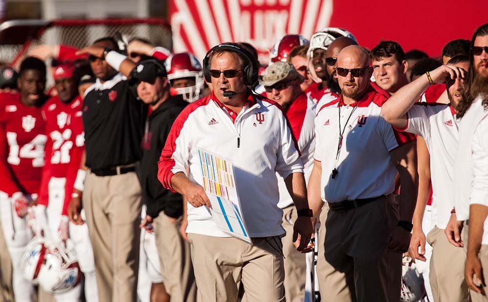 Head coach Kevin Wilson walks down the sideline as the Hoosiers make a play against Penn State during the second half on Saturday at Memorial Stadium.