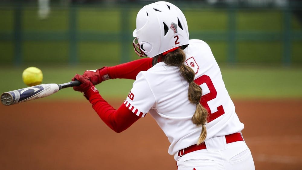 Then-freshman pitcher Macy Montgomery swings the bat March 28, 2021, at Andy Mohr Field. Indiana will play Ohio State in a three-game series on March 25-27 in Columbus, Ohio.