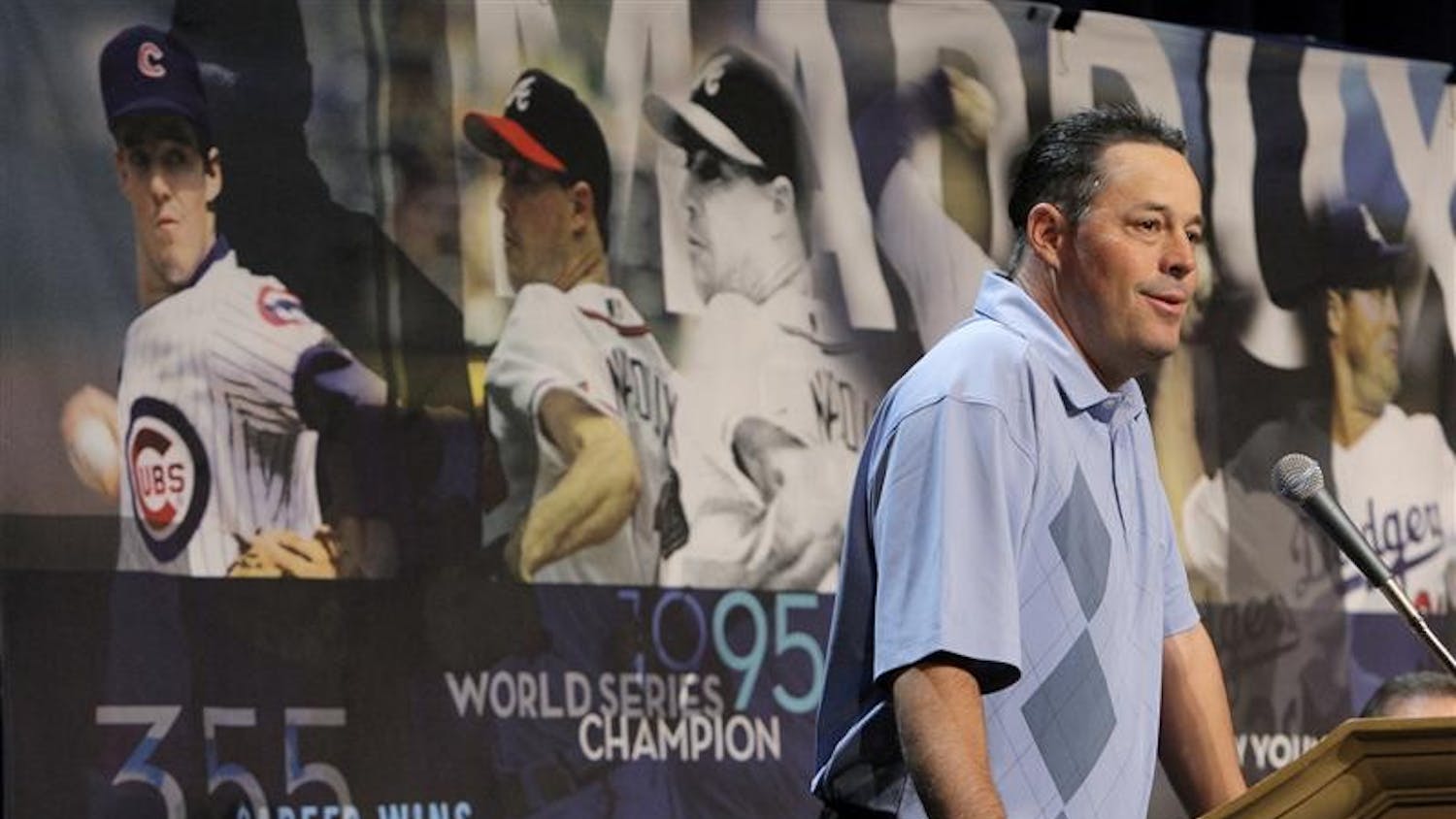 Four-time Cy Young winner Greg Maddux answers questions from the media after announcing his retirement at the baseball winter meetings Monday in Las Vegas.