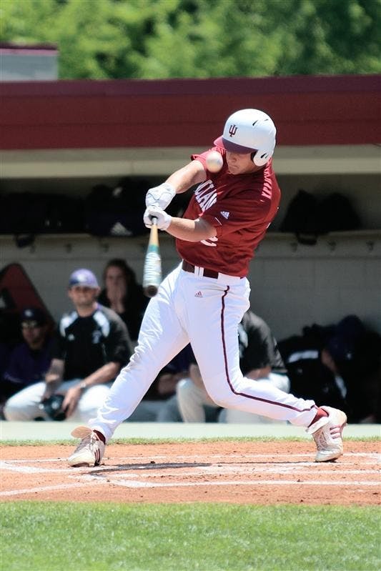 Freshman outfielder Alex Dickerson fouls off a pitch by Northwestern's Zach Morton Sunday afternoon at Sembower Field.