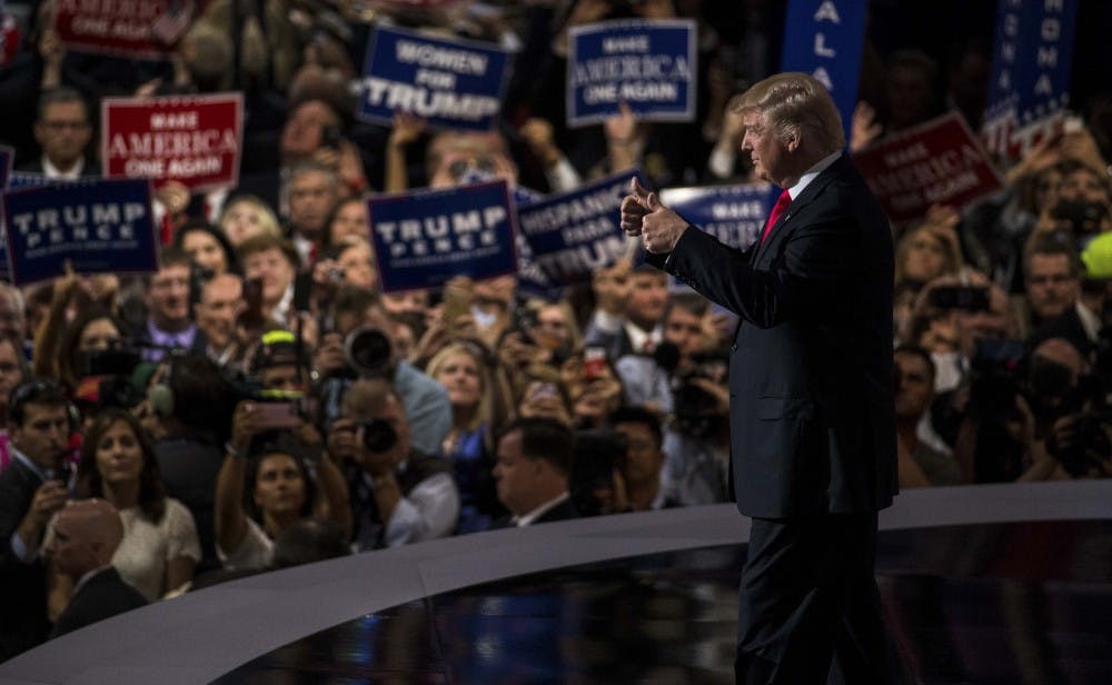 Republican presidential nominee Donald Trump gives the audience two thumbs up while walking on stage to accept the Republican nomination on July 21 in Cleveland, Ohio.