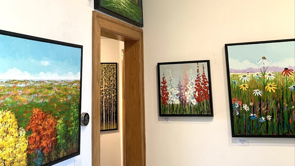 Acrylic paintings by Derek Collins are displayed on Jan. 28, 2023 at The Venue Gallery . The Venue will feature Derek Collins through the month of February during the Gallery Walk.
