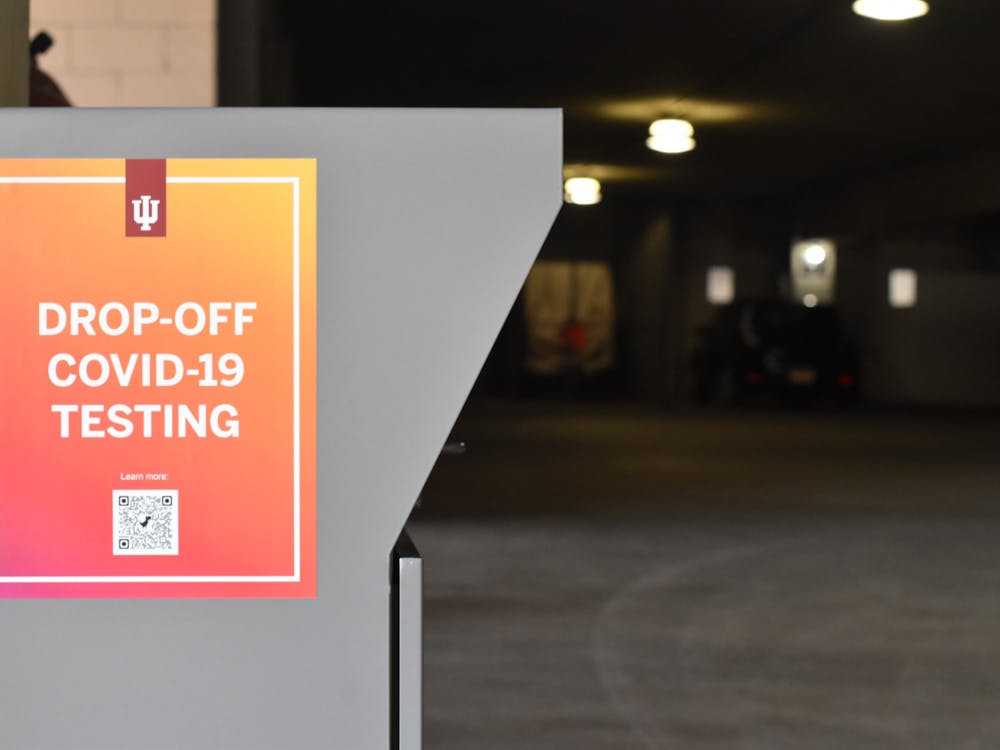 A COVID-19 drop-off box located in the East Garage. Test kits are available on campus at drop-off locations. IU-Bloomington reported 10 positive COVID-19 cases this week and announced drop-off testing will be the sole option for asymptomatic testing.