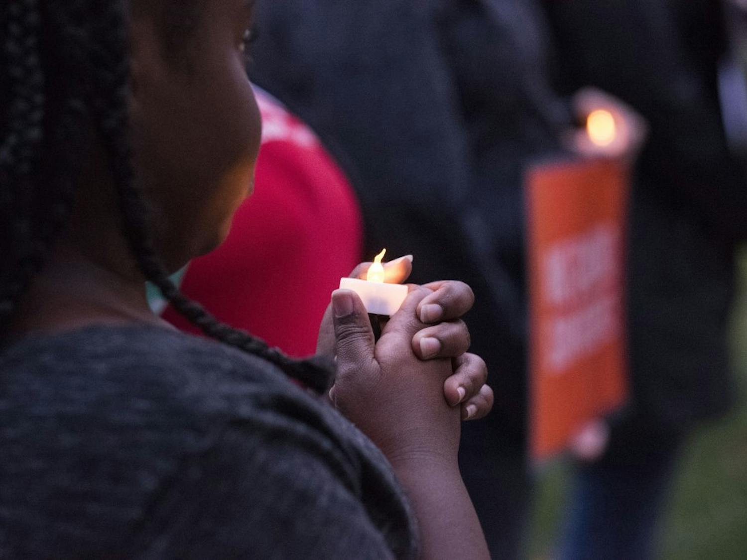 GALLERY: People gather to honor and remember victims of the Las Vegas shooting