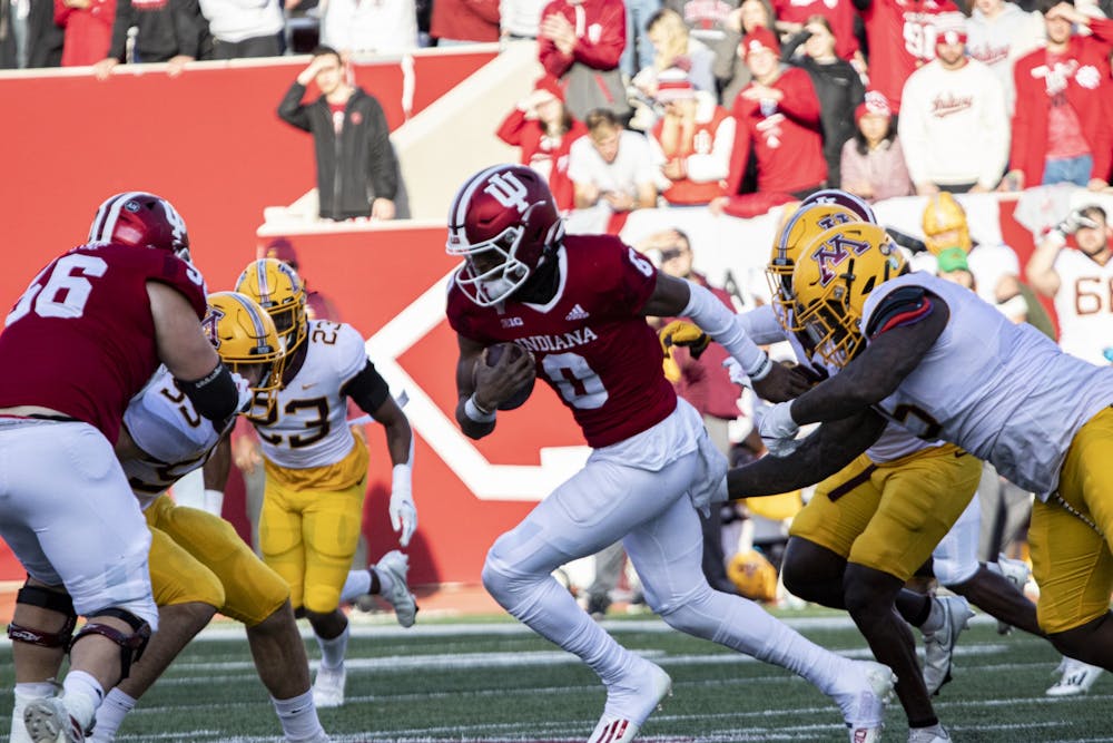 <p>IU freshman quarterback Donaven McCulley runs against Minnesota on Nov. 20, 2021, at Memorial Stadium. McCulley led Indiana in rushing with 72 yards during the game Saturday.</p>