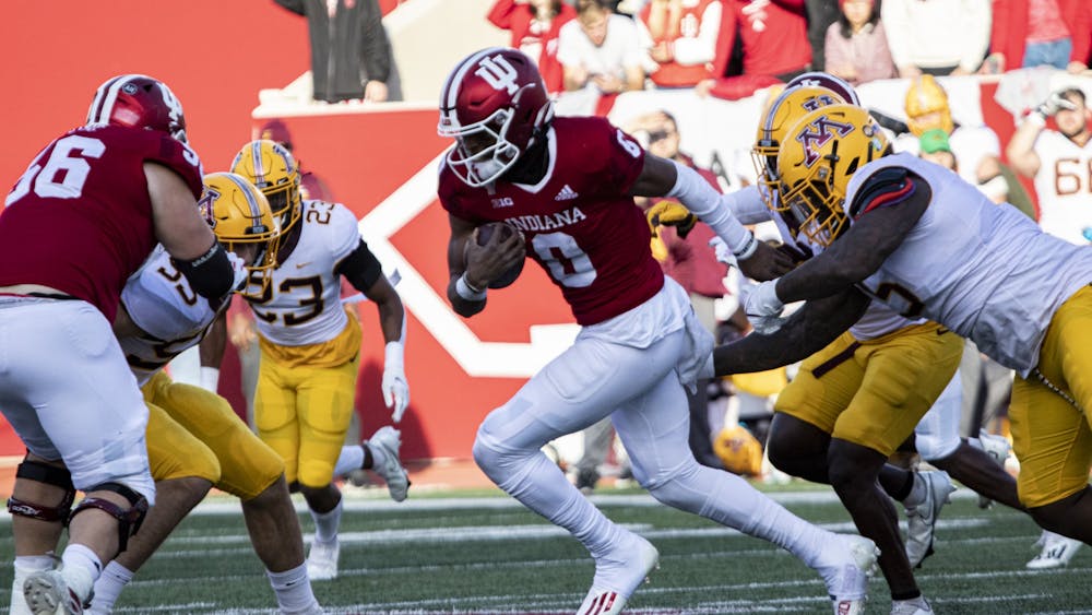 IU freshman quarterback Donaven McCulley runs against Minnesota on Nov. 20, 2021, at Memorial Stadium. McCulley led Indiana in rushing with 72 yards during the game Saturday.