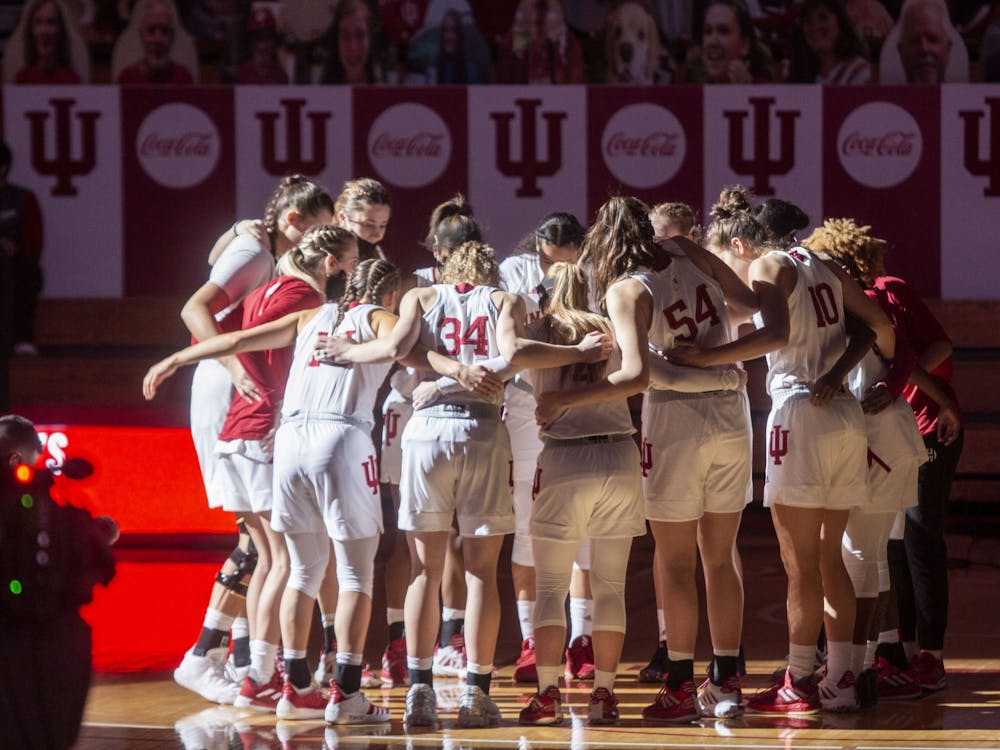 The IU women&#x27;s basketball team huddles before the start of its game against Wisconsin on Jan. 10, 2021, in Simon Skjodt Assembly Hall. Class of 2023 guard Lenee Beaumont committed to Indiana per her Twitter account on Thursday.
