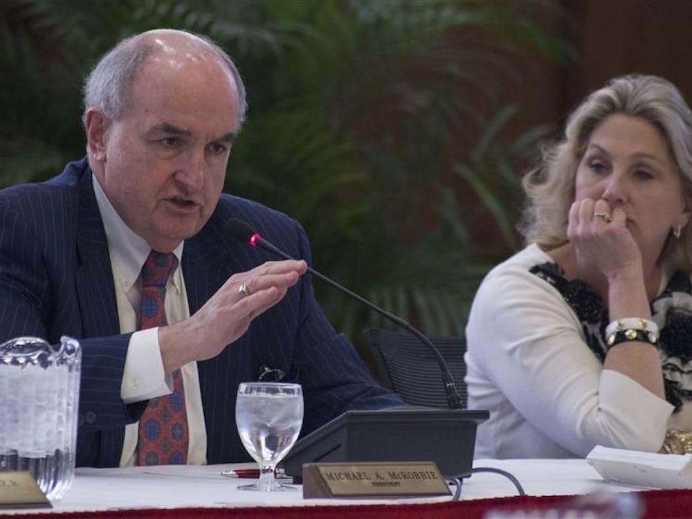 IU President Michael McRobbie introduces a presentation at the Board of Trustees Academic Meeting April 10, 2014, at Franklin Hall. McRobbie plans to step down in June, and a search committee to find his replacement has begun interviewing candidates. 