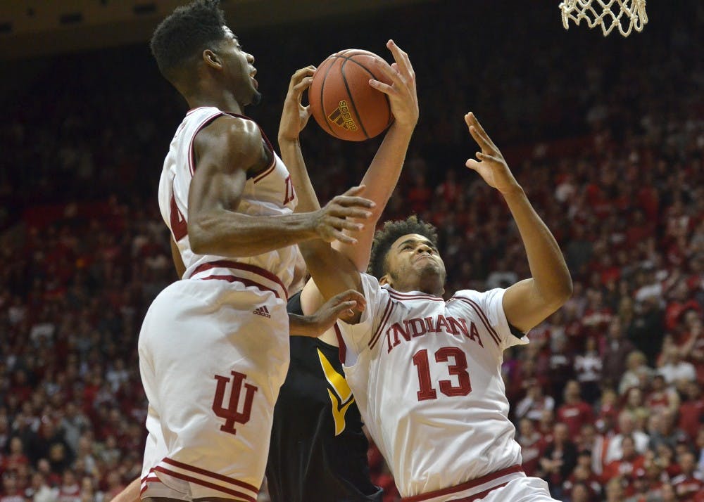 Then-freshman forward Juwan Morgan and then-sophomore guard Robert Johnson go up for a rebound against then-No. 4 Iowa in February 2016 at Simon Skjodt Assembly Hall, then known as Assembly Hall. The Hoosiers won 85-78.