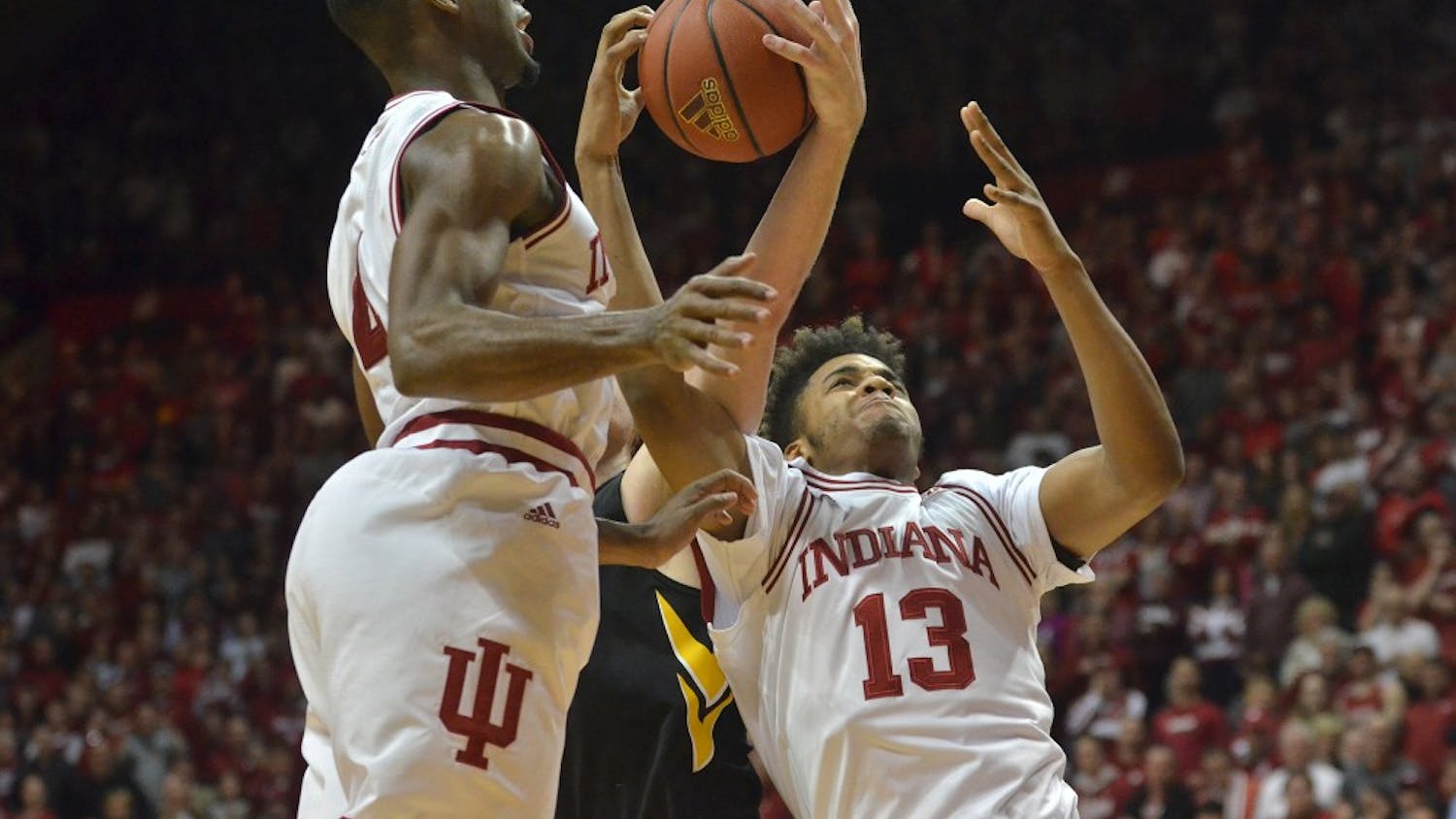 Then-freshman forward Juwan Morgan and then-sophomore guard Robert Johnson go up for a rebound against then-No. 4 Iowa in February 2016 at Simon Skjodt Assembly Hall, then known as Assembly Hall. The Hoosiers won 85-78.