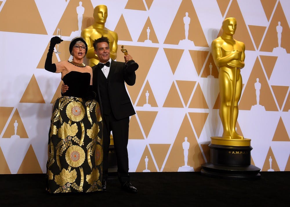 <p>Foreign Language Film winner Sebastian Lelio and presenter Rita Moreno pose together backstage at the 90th Academy Awards on Sunday, March 4, 2018, at the Dolby Theatre in Hollywood.</p>