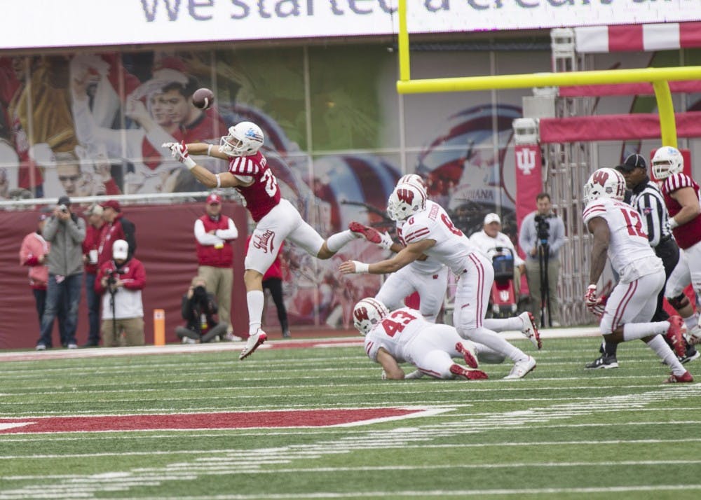 Junior wide receiver Luke Timian is unable to complete a catch at Memorial Stadium on Saturday against No. 9 Wisconsin. IU lost to Wisconsin 45-17 to drop to 3-6 overall, and 0-6 in Big Ten play this season.