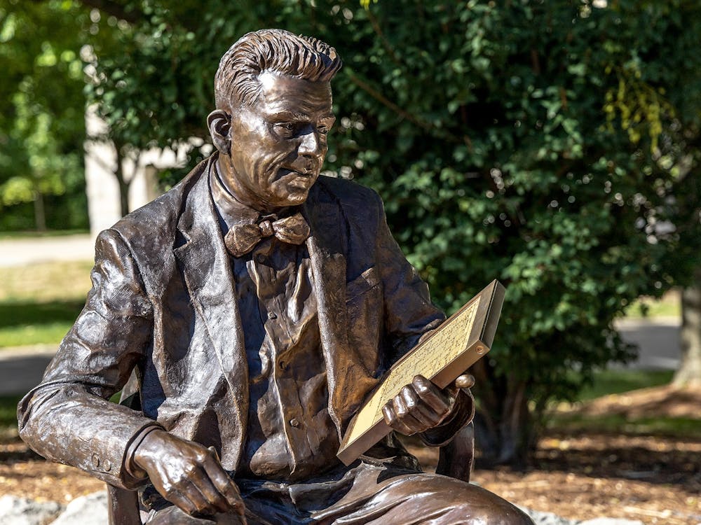 A bronze sculpture of Alfred C. Kinsey is seen Sept. 27, 2022, outside Lindley Hall. Melanie Cooper Pennington, a lecturer of sculpture at the Eskenazi School of Art, Architecture and Design, was commissioned to make the sculpture for the 75th anniversary of the Kinsey Institute.
