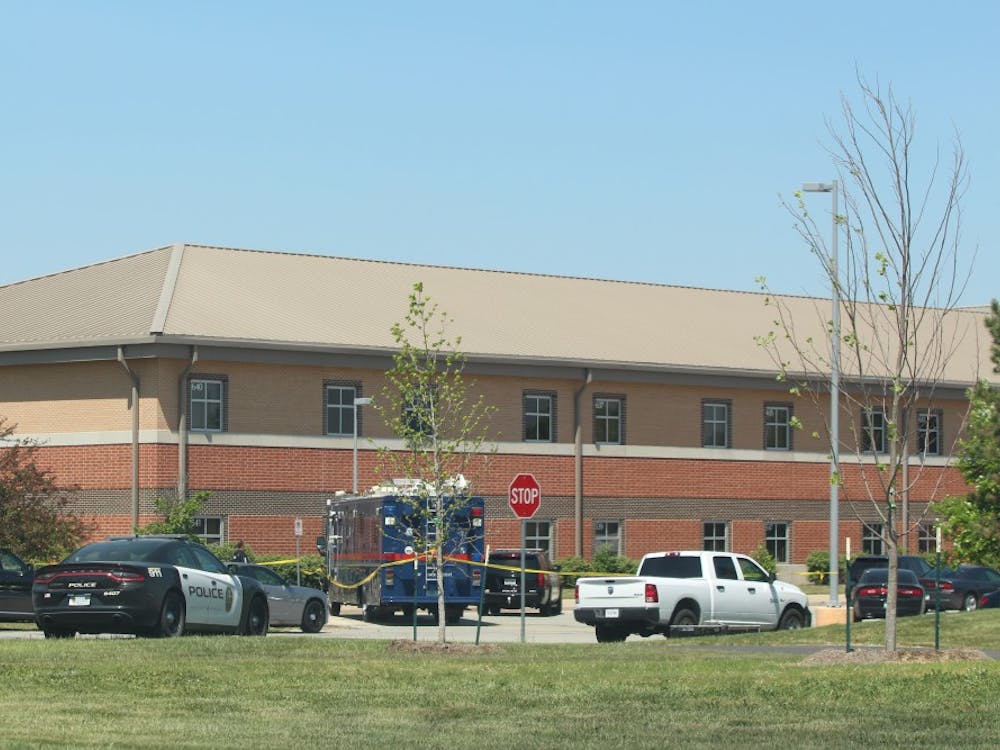Hours after a school shooting Friday, May 25, yellow tape lines the grounds of Noblesville West Middle School. The male suspect, who injured a student and a teacher at the school, was taken into custody.