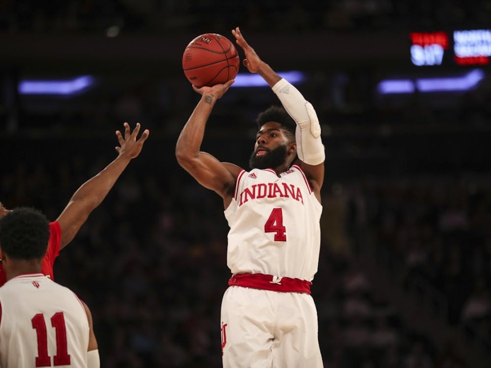 Senior guard Robert Johnson shoots the ball during the Hoosiers' game against the Rutgers Scarlet Knights on Thursday during the Big Ten Tournament at Madison Square Garden in New York City. The Hoosiers were falling to the Scarlet Knights at halftime, 29-28.