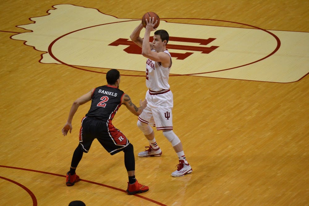 Junior guard Nick Zeisloft looks to pass the ball during the game against Rutgers on Saturday at Assembly Hall.