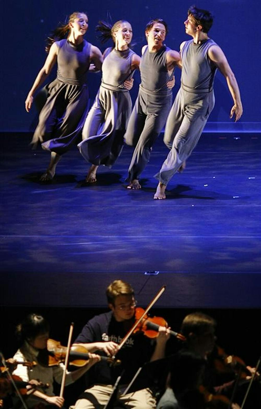 Dancers perform while the orchestra plays during "The Community of Dance" dress rehearsals Thursday evening at Ruth N. Halls Theatre. The performance features performances by various groups from the Jacob's School and the Theatre department, as well as works from faculty in various departments from IU.