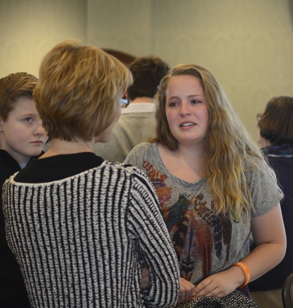 Elizabeth Haviland, sister of Anthony Wilkerson, IU student who passed away last November, talks to Kristen Hill, mother of Alexander Ruesta, IU student who passed away last December, after the remembrance event held by Indiana University on Sunday afternoon at the president’s room in IMU.