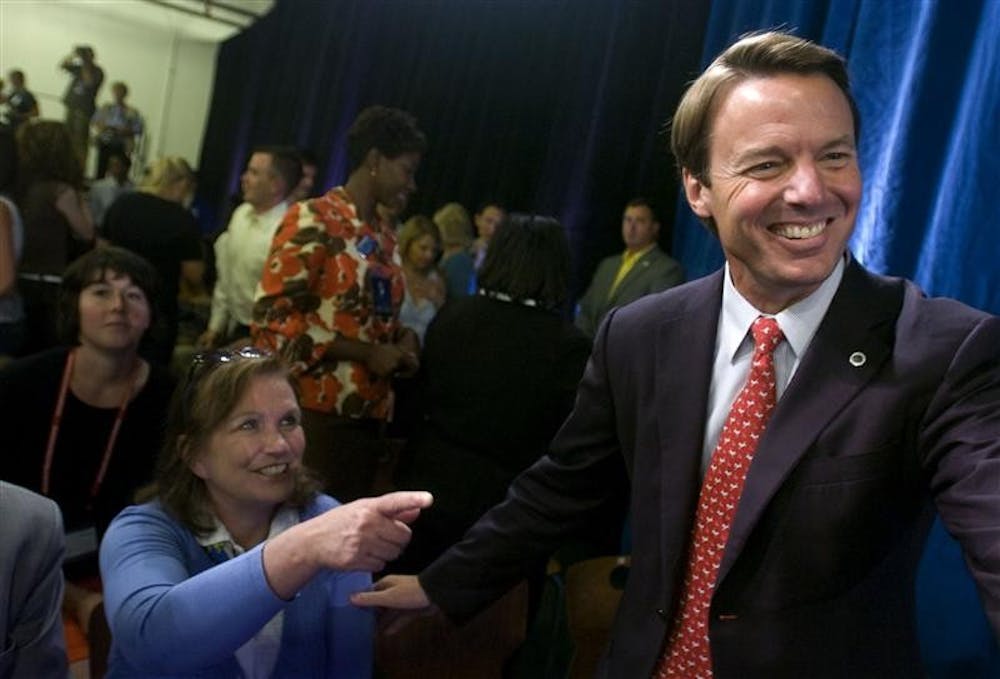 John and Elizabeth Edwards, left, attend a rally at the state fairgrounds on June 9 in Raleigh, North Carolina. Edwards will speak at 7 p.m. today in the IU Auditorium.