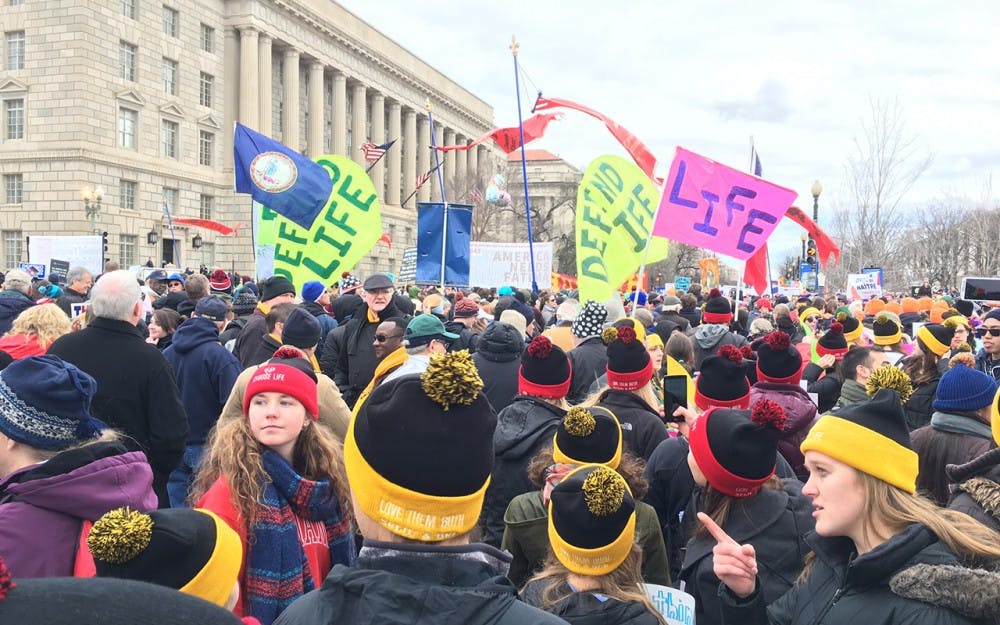 Emily Eherenman, Vice President for IU’s Students for Life, looks back in the midst of the crowd. More than 650,000 people were estimated to have been in attendance for the March for Life.