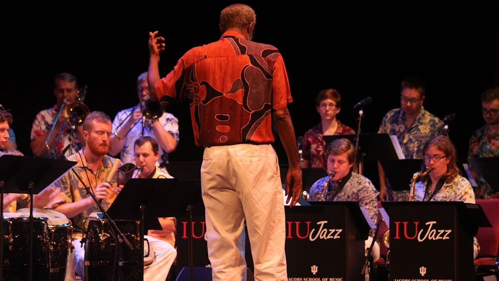 Jacobs School of Music director Wayne Wallace conducts the students of the Latin Jazz Ensemble Monday at the Buskirk Chumley Theater. The Latin Jazz Ensemble will perform at 8 p.m. on April 18 as one of seven events in the Latin American Music Center&#x27;s Spring Festival.