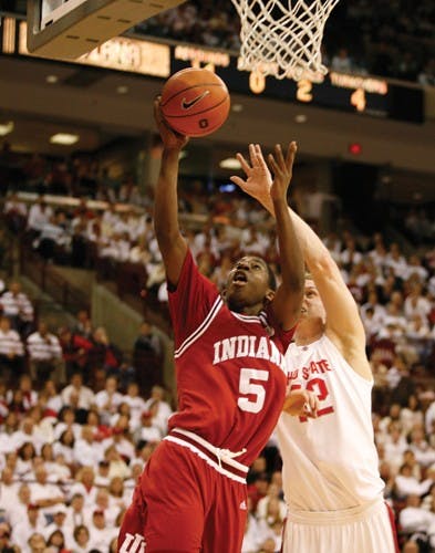 Jacob KrieseFreshman Jordan Crawford reaches for the basket against Ohio State's Matt Terwilliger Sunday afternoon in Columbus, Ohio.  Crawford scored 8 points in the Hoosiers 59-53 victory.
