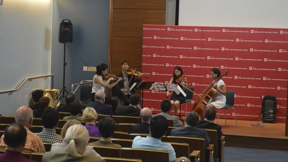 From left to right, Sun Huh, Nathanial Shapiro, Jinrok Kim and Seung Ah Hong play the song, Springtime in my Hometown (variations on a Korean folksong), during the opening ceremony for the Institute for Korean Studies Friday afternoon. 