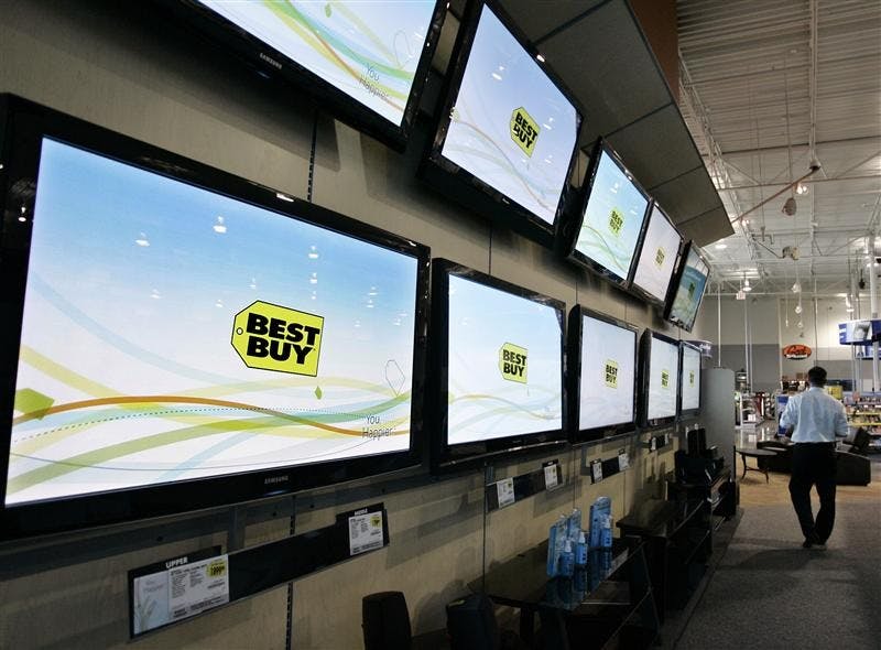 Flat panel televisions sit on display on Sept. 16 at a Best Buy store in Mountain View, Calif. Best Buy Co. sharply cut its fiscal 2009 earnings outlook on Nov. 12 below analyst estimates amid what the electronics retailer called the toughest retail environment it has ever seen.