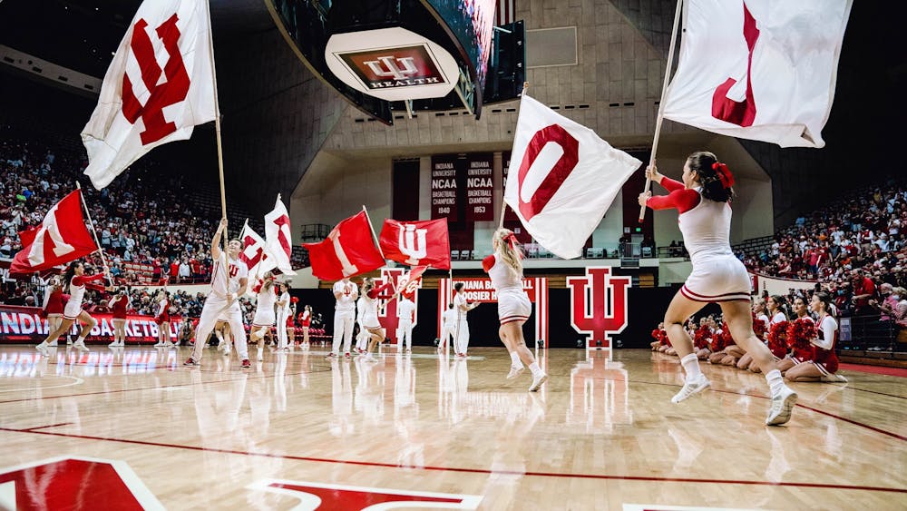 Indiana cheerleaders pump up the crowd before Hoosier Hysteria on Oct. 2, 2021, at Simon Skjodt Assembly Hall.