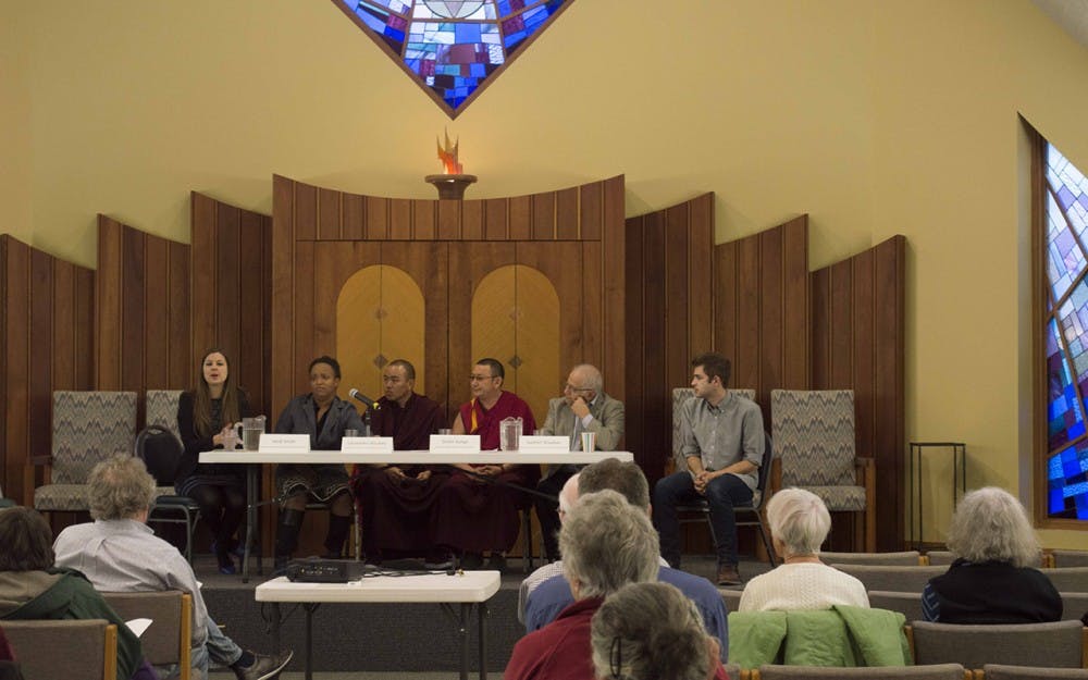 From left to right, Director of Indianapolis Archdiocese Refugee Services Heidi Smith, Beth Shalom Task Force on Refugee Resettlement member Cassandra Housley, Tibetan Mongolian Buddhist Cultural Center representative Geshe Kunga, and Chair of the Arab American Association of Bloomington Kadhim Shaaban speak about the role religion plays in refugee resettlement. The event took place Tuesday evening at&nbsp;the Beth Shalom Jewish Center.&nbsp;&nbsp;
