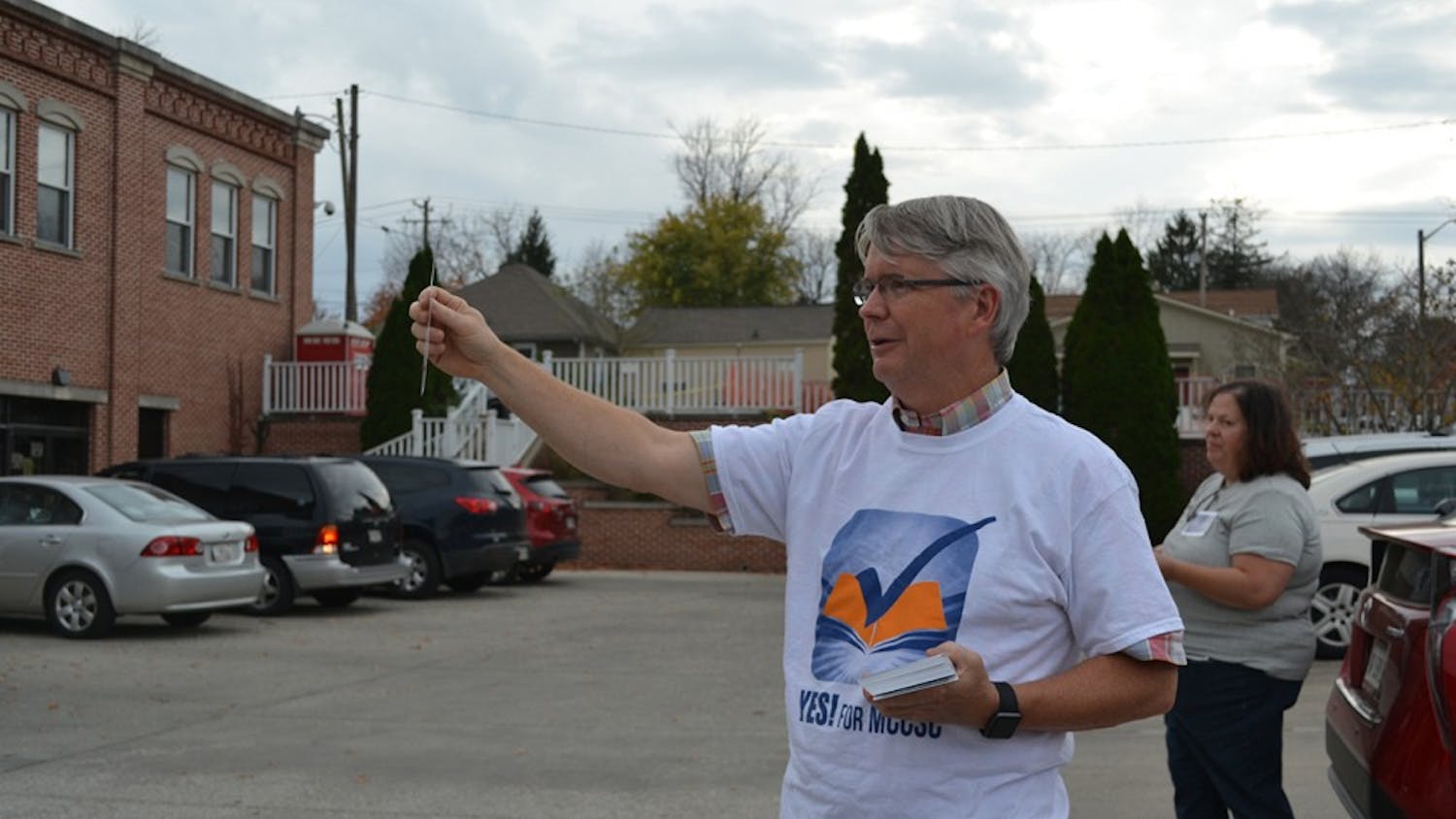 Mayor John Hamilton campaigns for the referendum outside Election Central on Wednesday night.