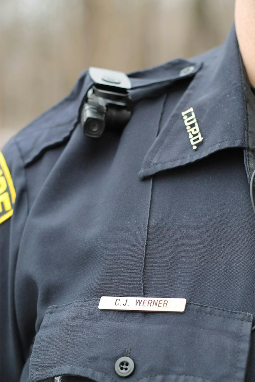 Officer Chad Warner wears a shoulder mounted camera on Mar. 4, 2015 in field test.