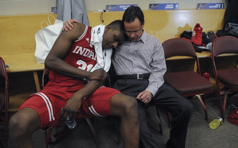 Head Coach Tom Crean consoles freshman center Thomas Bryant after the Hoosiers were eliminated from the NCAA tournament on Friday at the Wells Fargo Center. Indiana lost to North Carolina 101-86 on March 3, 2016.
